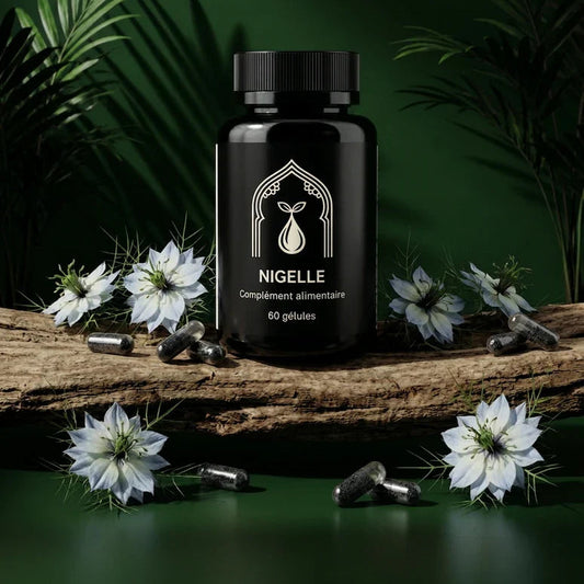 Flacon noir de Nigelle, 60 gélules, avec capsules sombres et fleurs blanches.