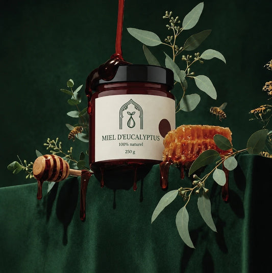 Pot de miel d’eucalyptus 250 g en verre ambré, couvercle noir, label crème.